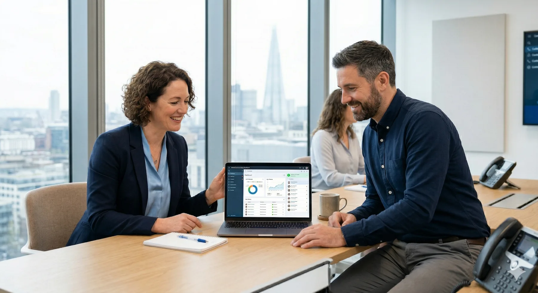 A telecoms reseller discussing a Wildix training assignment with a business colleague